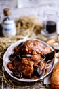 Belgian rabbit stew with ale and prune.style rustic Royalty Free Stock Photo
