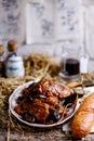 Belgian rabbit stew with ale and prune.style rustic Royalty Free Stock Photo