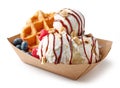 Belgian waffle with fresh berries and vanilla ice cream