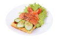 Belgian waffle with sliced salted salmon, tomatoes, cucumbers, l