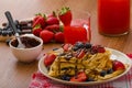 Belgian waffles with blueberries, strawberries Royalty Free Stock Photo