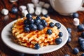 Belgian Waffles with Blueberry and Syrup. Royalty Free Stock Photo