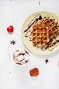 Belgian waffles and cocoa with marshmallows for breakfast. Top view. Royalty Free Stock Photo