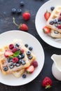 Belgian waffles with fresh berries. Royalty Free Stock Photo