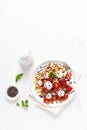 Belgian waffles with fresh strawberry, chocolate topping and whipped cream Royalty Free Stock Photo