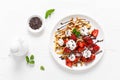 Belgian waffles with fresh strawberry, chocolate topping and whipped cream Royalty Free Stock Photo