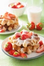 Belgian waffles with icing sugar and strawberry Royalty Free Stock Photo