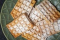 Belgian waffles sprinkled with powdered sugar