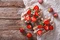 Belgian waffles with strawberries and powdered sugar closeup. Ho Royalty Free Stock Photo