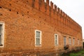 Belgioioso characteristic ancient castle perspective walls lace Po Valley particular detail balcony windows battlements lace Italy Royalty Free Stock Photo