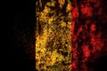 Belgium, Belgian flag on grunge metal background texture with scratches and cracks Royalty Free Stock Photo
