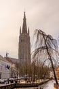 Belgium, Bruges, Brugge, a canal with church of our lady in the Royalty Free Stock Photo