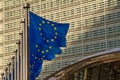 Belgium, Brussels, European flags in front of the Berlaymont, headquarters of the European Commission Royalty Free Stock Photo