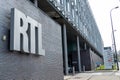 Belgium, Brussels, Facade of the RTL House with the RTL logo at the entrance of the building