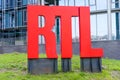 Belgium, Brussels, Facade of the RTL House with the RTL logo in red