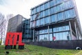 Belgium, Brussels, Facade of the RTL House with the RTL logo in red