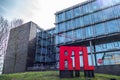 Belgium, Brussels, Facade of the RTL House with the RTL logo in red