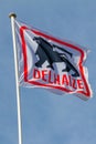 Belgium, Brussels, Flag with the logo of the company Delhaize le Lion on the a supermarket in Brussels Royalty Free Stock Photo