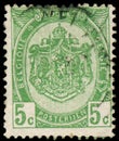 Stamp printed in Belgium shows Belgian coat of arms