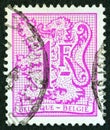 BELGIUM - CIRCA 1977: A stamp printed in Belgium shows the Heraldic lion and value 1F, circa 1977. Royalty Free Stock Photo