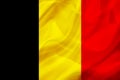 Belgium country flag on silk or silky waving texture Royalty Free Stock Photo