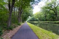 Belgium: cycling on the towpath Royalty Free Stock Photo