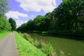 Belgium: cycling on the towpath Royalty Free Stock Photo