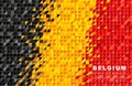 Belgium flag. Abstract background of small triangles in the form of colorful black, yellow and red stripes of the Belgian flag