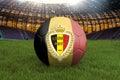 Belgium football team ball on big stadium background with Belgium Team logo competition concept. Belgium flag on ball team tournam Royalty Free Stock Photo