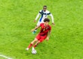 Belgium national football team midfielder Axel Witsel against Finland midfielder Glen Kamara during EURO 2020 match Finland vs Royalty Free Stock Photo