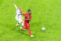 Belgium national football team striker Jeremy Doku against Finland fullback Jere Uronen during EURO 2020 match Finland vs Belgium