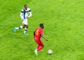 Belgium national football team striker Jeremy Doku against Finland midfielder Glen Kamara during EURO 2020 match Finland vs