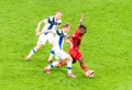 Belgium national football team striker Jeremy Doku against Finland players Joni Kauko and Rasmus Schuller during EURO 2020 match