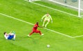 Belgium national football team striker Romelu Lukaku against Russia defender Georgi Dzhikiya and goalkeeper Anton Shunin during