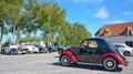 Beatiful black and red old timer at a car show in oudenburg, Belgium Royalty Free Stock Photo