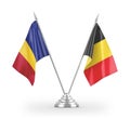 Belgium and Romania table flags isolated on white 3D rendering
