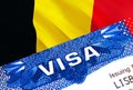 Belgium Visa in passport. USA immigration Visa for Belgium citizens focusing on word VISA. Travel Belgium visa in national Royalty Free Stock Photo