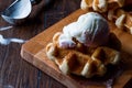 Belgium Waffle with ice cream on wooden surface. Royalty Free Stock Photo