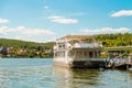 Pleasure ship Riviera River - comfortable two-deck houseboat on the pier at Picnic Park
