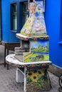 Colorfully painted Russian folk stove. Authentic interior detail of Russian folk hut.