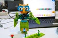 Game constructor Lego Education WeDo 2.0. Robotic owl assembled by a child learning at a