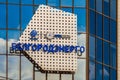Belgorod, Russia. Emblem and logos close-up on glass mirror facade of building Belgorodenergo.