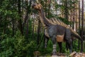 Full-size iguanodon statue in the forest of Belgorod dinopark Royalty Free Stock Photo