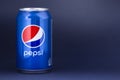 Belgorod , Russia - MAY, 17, 2020: Pepsi drink in a can on ice isolated on blue background. Carbonated soft drink produced by
