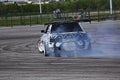 Belgorod , Russia - OCT 13, 2018: A drift racing car in action with smoking tires in track