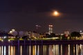 Belgrade and river Sava at night. Beautiful city view with moon over the city Royalty Free Stock Photo