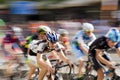 Motion blur panning shot of young bicycle racers competing