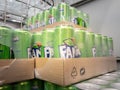 BELGRADE, SERBIA - AUGUST 5, 2023: Logo of Fanta Exotic on green cans for sale in Belgrade. Fanta is a german brand of orange soda