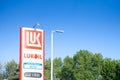 BELGRADE, SERBIA - AUGUST 23, 2022: Lukoil logo on a gas station in Serbia. Lukoil Corporation is the main Russian oil and gas Royalty Free Stock Photo