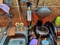 Belgrade, Serbia, December 12, 2020. Kitchen, countertop with sink, top view. Home daily life. The washed dishes are